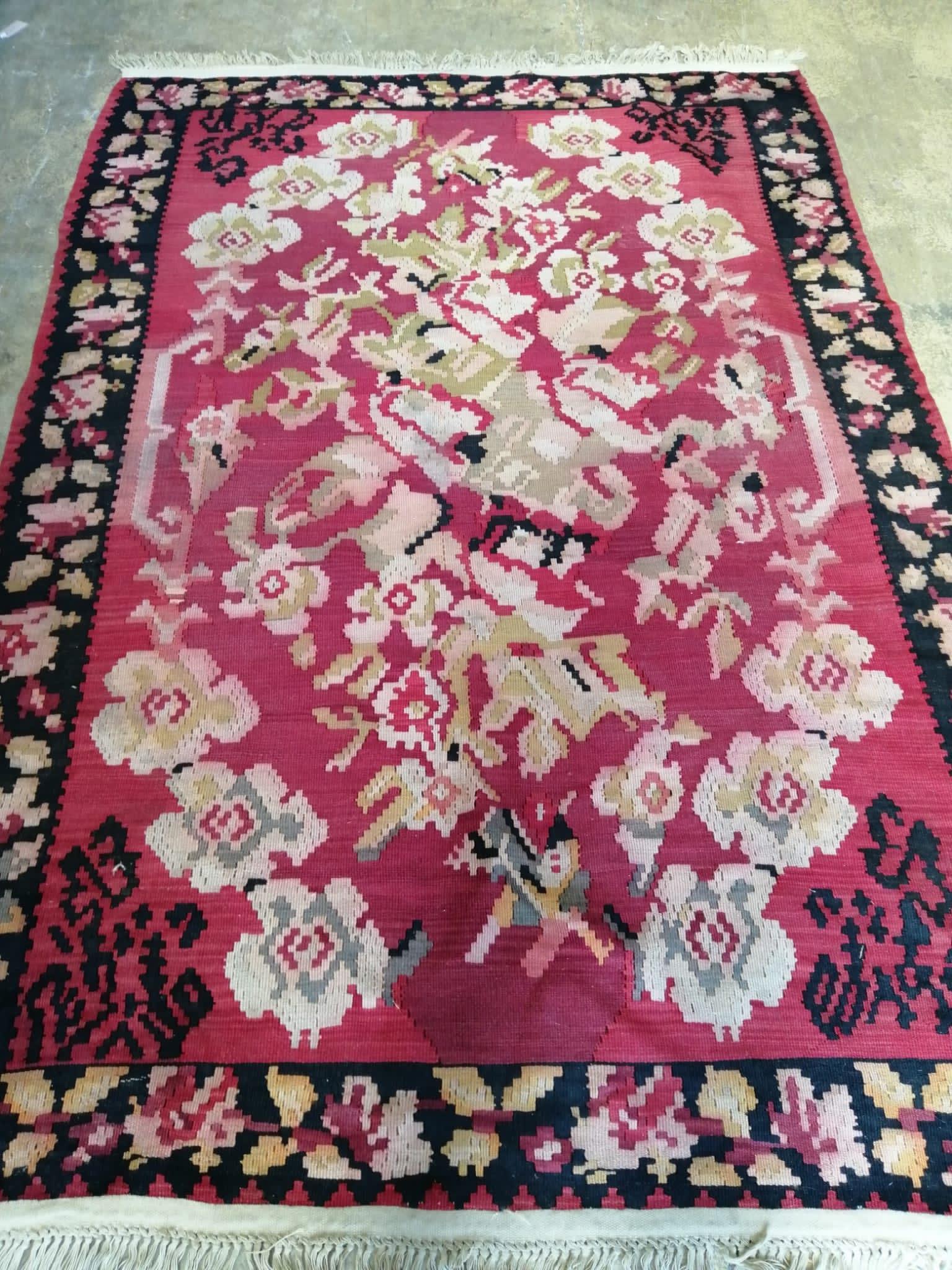 A red ground flat weave Kelim rug, 220 x 150cm